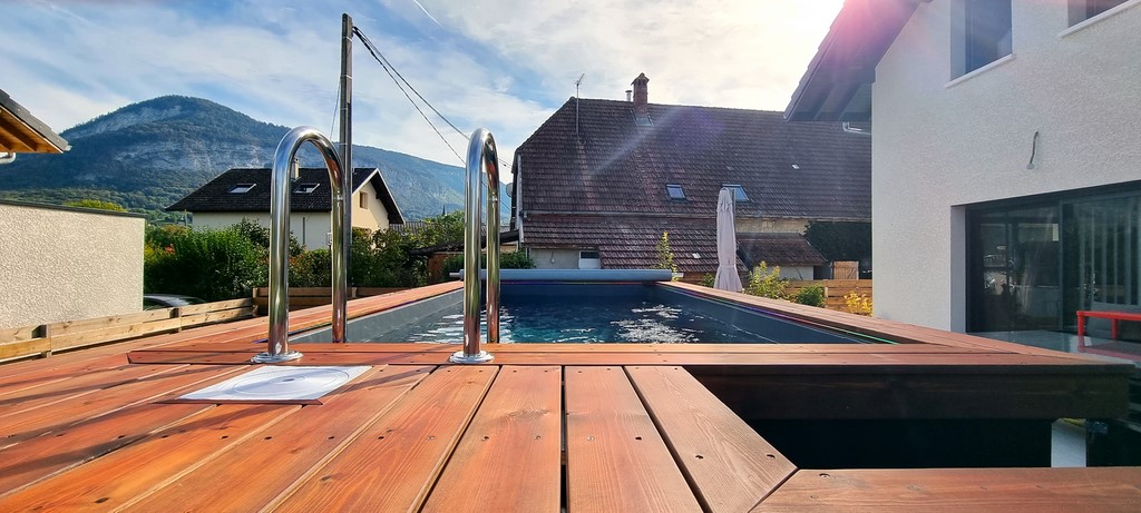 piscine container vue sur la terrasse bois du modele nemo